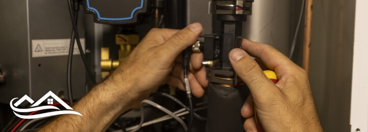 Technician working on a heating system